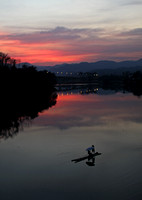 Yunnan - Xishuangbanna Pole Raft at Sunset
